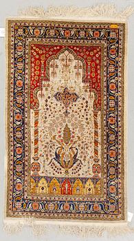 A rug, old Hereke, silke, ca 119 x 71 cm.