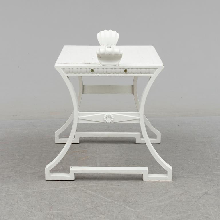 A "Sneckan" bench by Folke Bensow for Byarums bruk in the late 20th century.