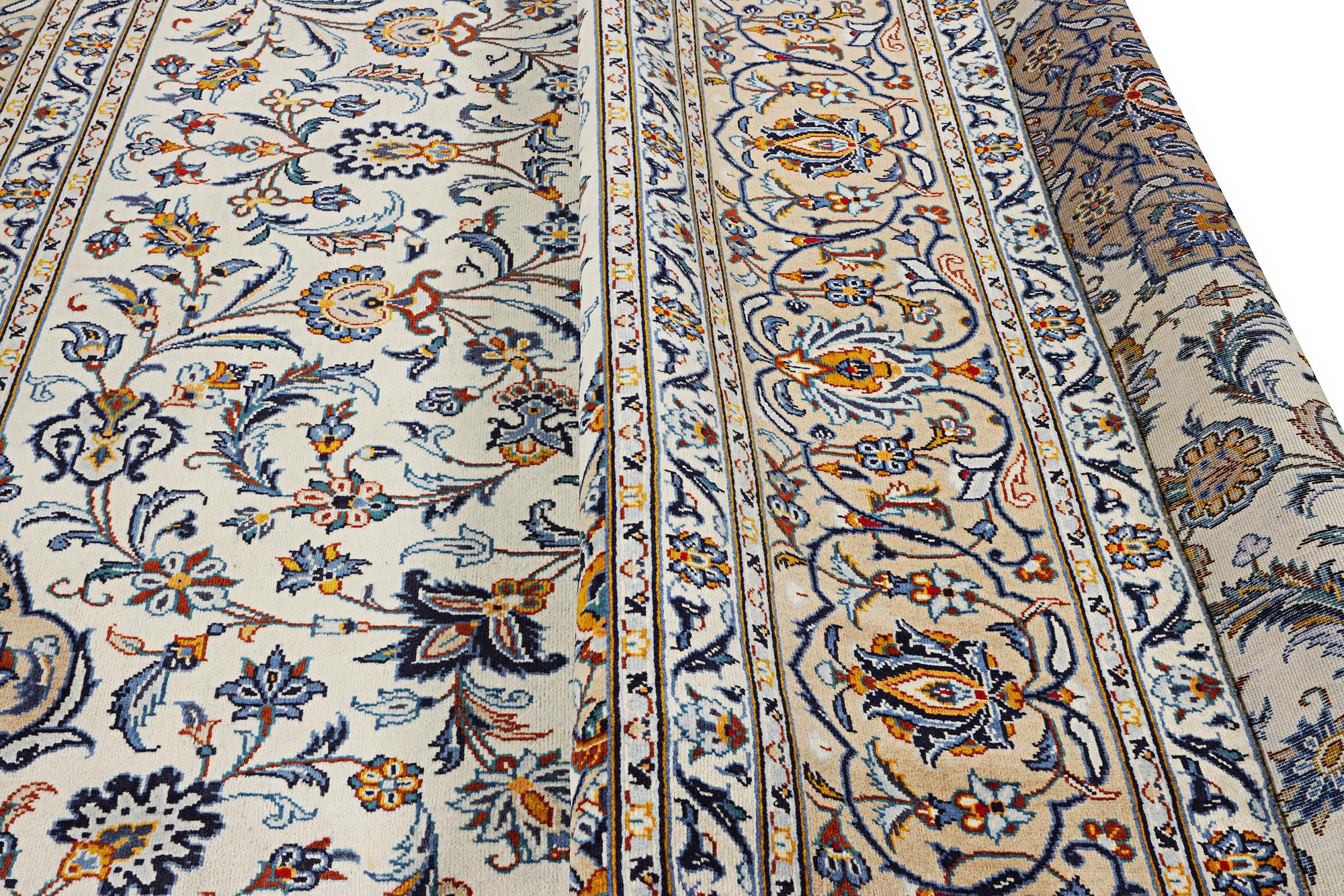 A Kashan carpet, c. 392 x 290 cm.