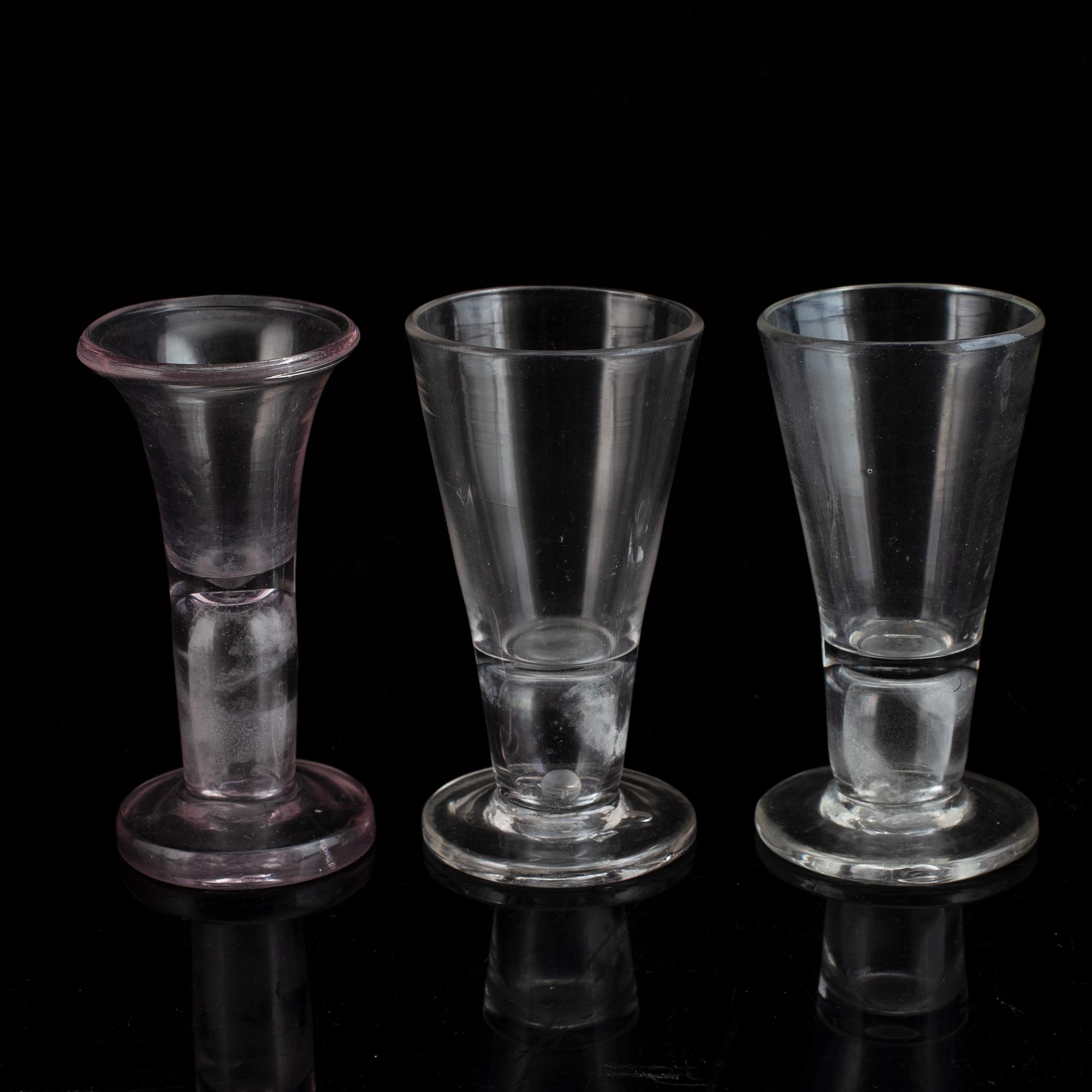 Six similar 18th century wine glasses.