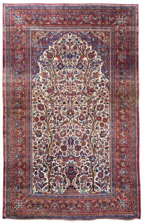 A RUG. A semi-antique silk Kashan. 205,5 x 131,5 cm.