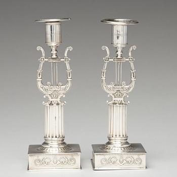 A pair of Swedish 19th century silver cadlesticks, mark of Johan Petter Grönvall, Stockholm 1823.