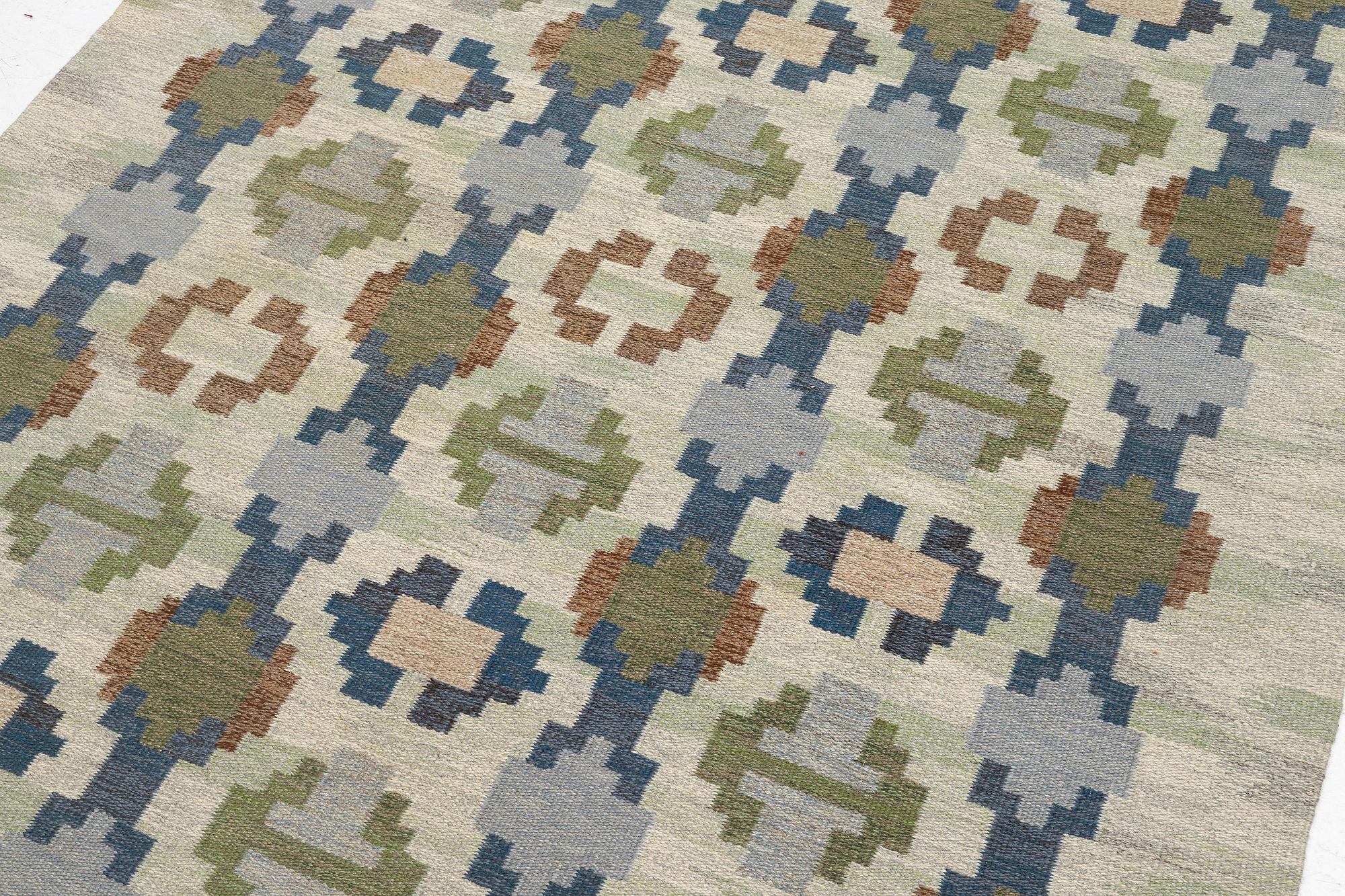 Judith Johansson, a carpet, 'Enebacken', flat weave, c. 307 x 196 cm, signed JJ.