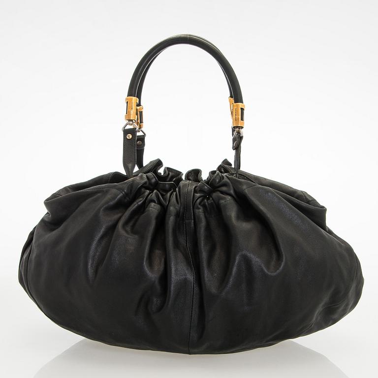 Emporio Armani, a leather bag.