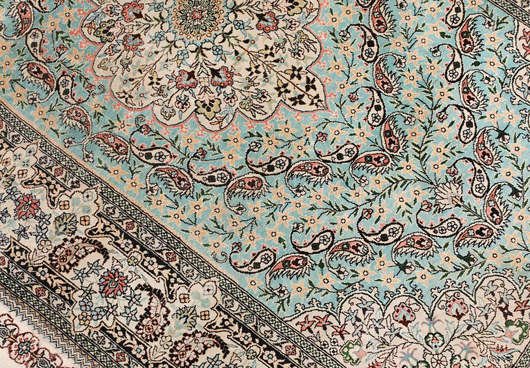 An Oriental silk rug, approx. 154 x 91 cm.