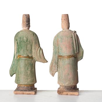 Two green and yellow glazed pottery figures of Ming officials, Ming style, 20th Century.