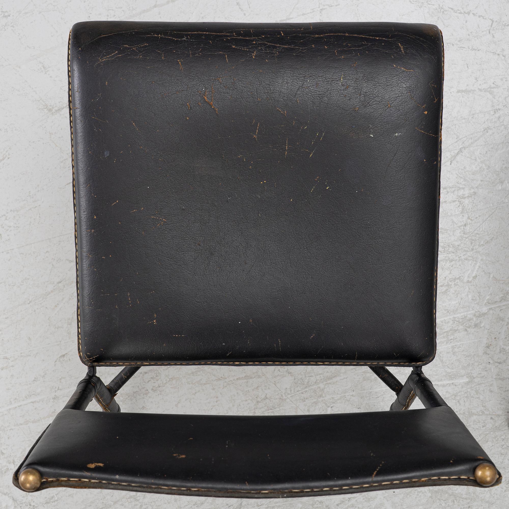Jacques Adnet, attributed to, chairs, a pair, France, mid-20th century.