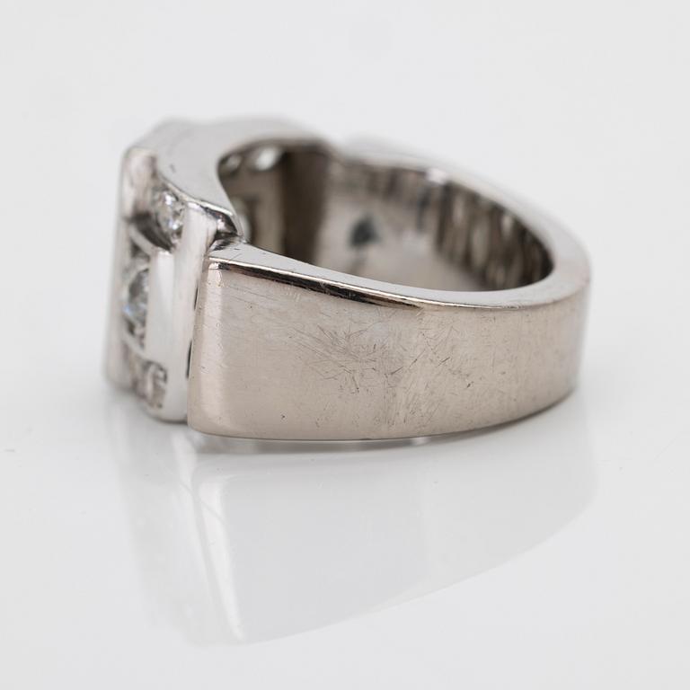 18K white gold ring with diamonds.