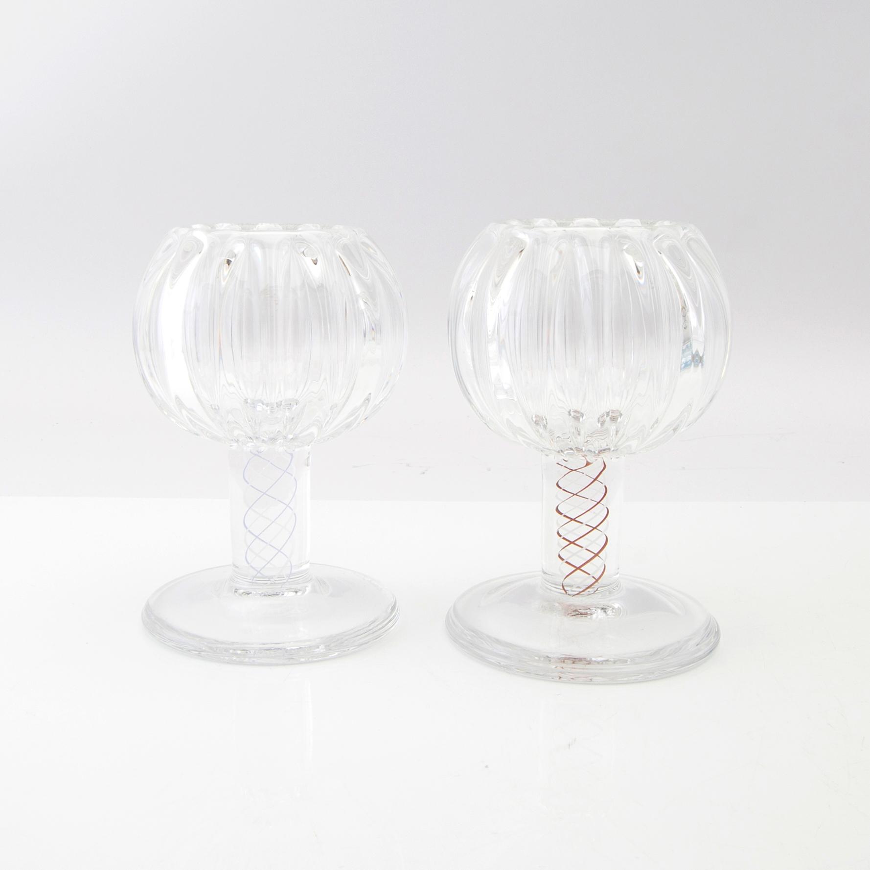 Berit Johansson, candlesticks/goblets 4 pcs signed Orrefors one marked unique.