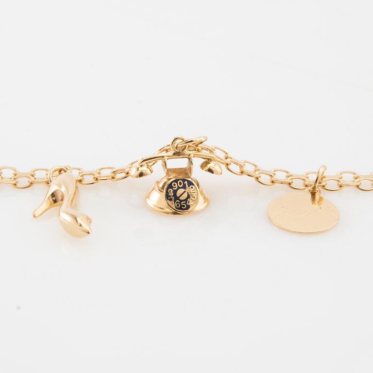 Bracelet 18K gold Bismarck link with charms.