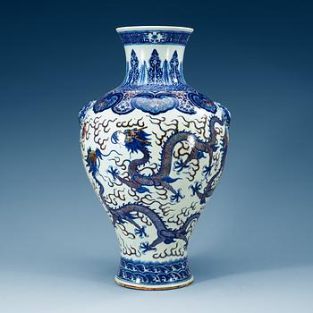 A large blue and white and red dragon vase, Qing dynasty, with Qianlong seal mark.