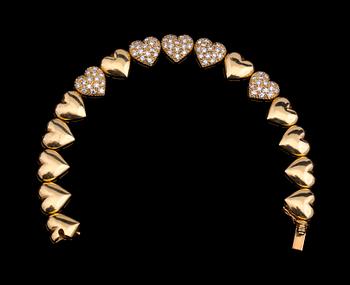 GARNITYR, 3 delar, 18 k guld med briljantslipade diamanter, totalt ca 6.00 ct. Totalvikt ca 100 g.