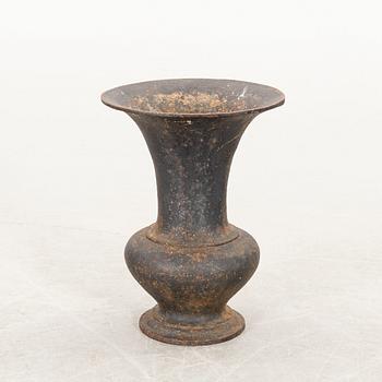 A cast iron  urn around 19th century.