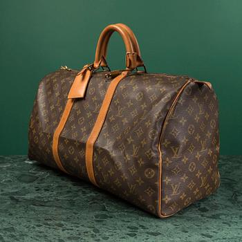 A monogram canvas weekendbag "Keepall 50" by Louis Vuitton.