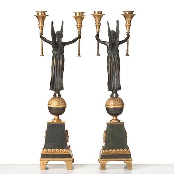 A pair of Empire-style 20th century candelabra.