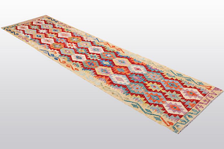 A runner, kilim, ca 314 x 80 cm.