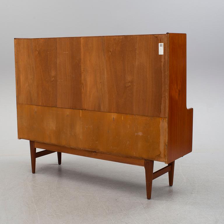 A teak veneered cabinet, 1960's.