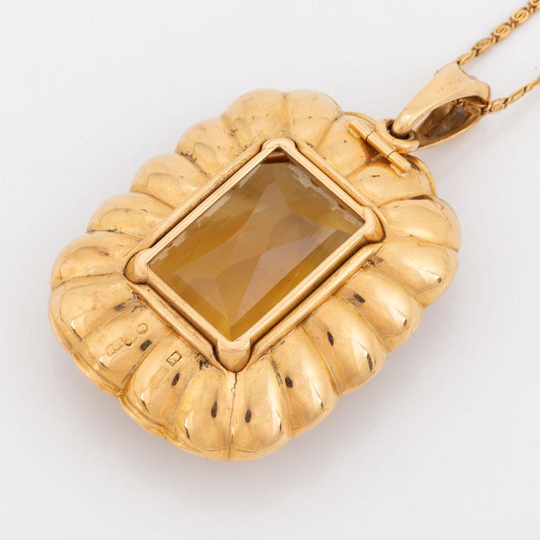 Hänge 18K guld med en fasettslipad citrin.