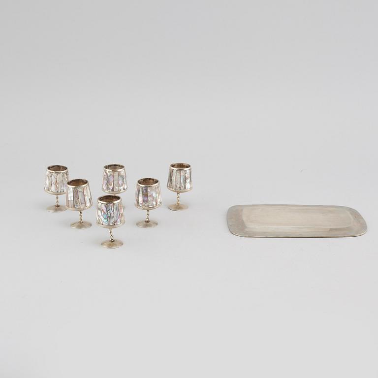 Six liqeur glasses on a tray, mother of pearl and alpaca, Mexico, second half of the 20th century.
