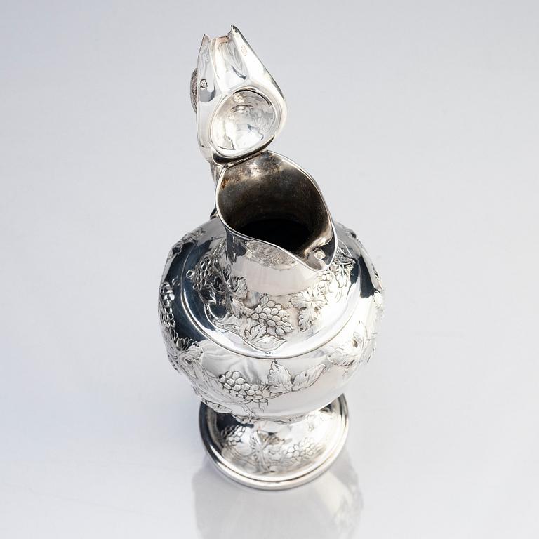 A George III sterling silver ewer, mark of John Scofield, London 1787.