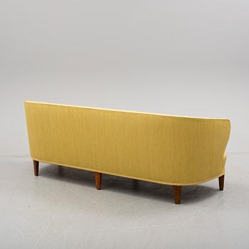 A mid 1900s sofa by Carl Malmsten.