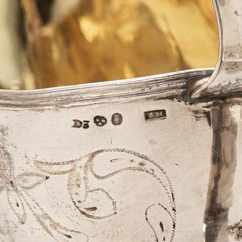 A Swedish Gustavian parcel-gilt silver sauce jug, mark of Daniel Hallman, Stockholm 1810.