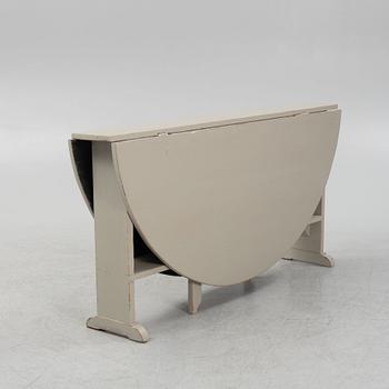 A painted gate-leg table, 19th Century.
