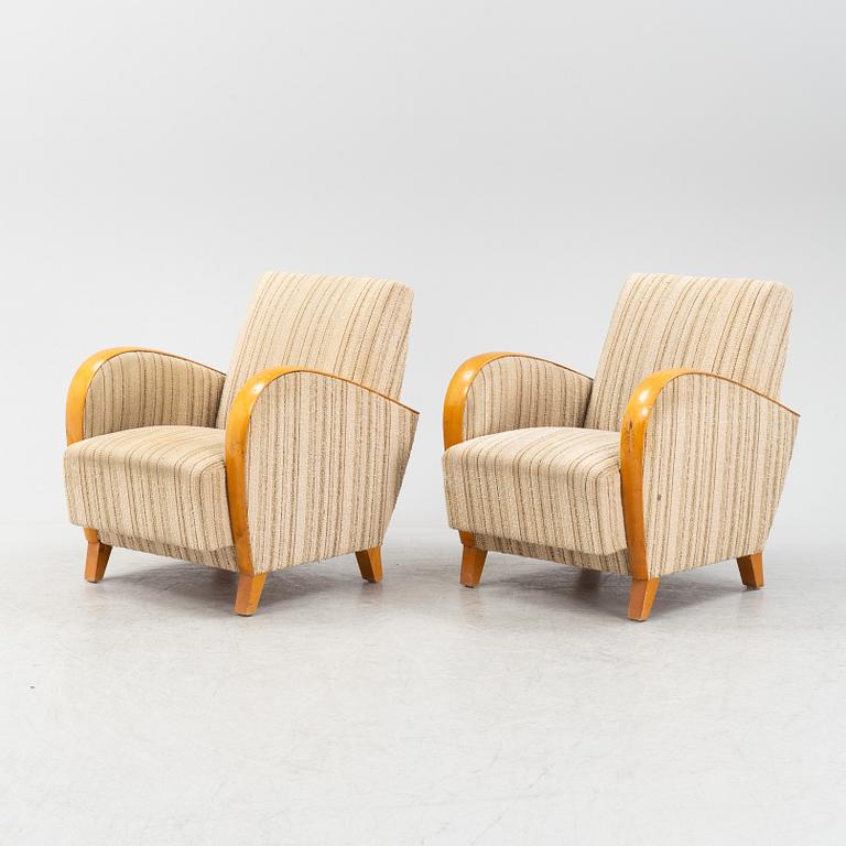 A pair of Swedish Modern easy chairs, Dux T-serie, 1940's/50's.
