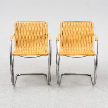 Ludwig Mies van der Roh, a pair of MR 20 steel and rattan armchairs, for Thonet, marked, designed 1927.