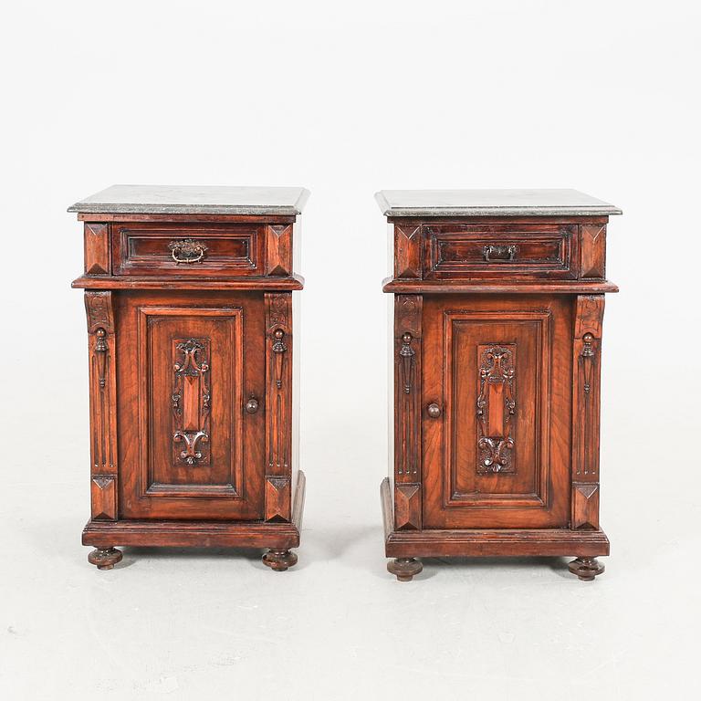 A pair of walnut bedside tables first half of the 20th century.