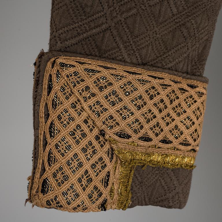 two theater coats from the late 20th century.