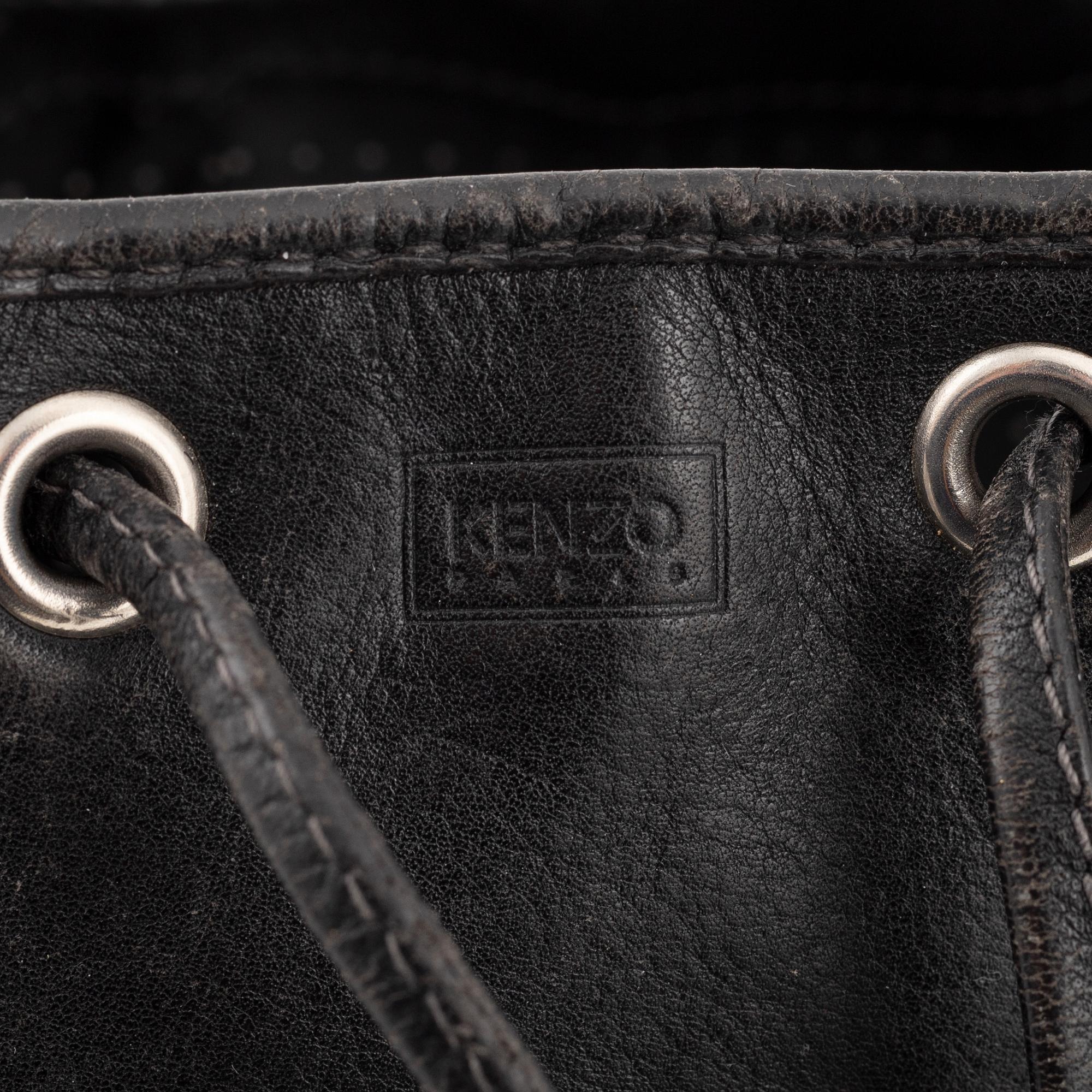 Kenzo, a black leather bucket bag.