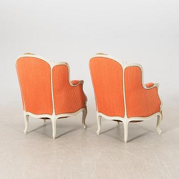 Bergèrer/fåtöljer ett par Rokoko-stil 1900-talets första hälft.