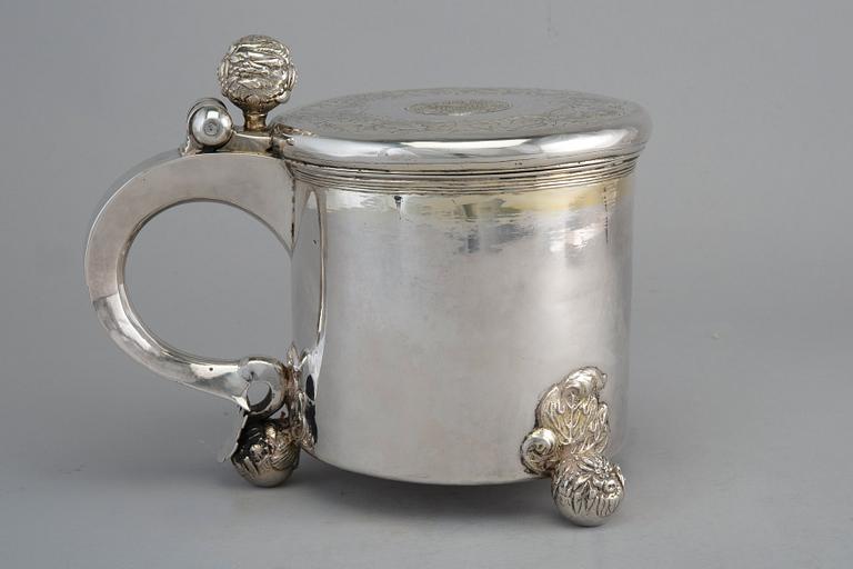 A TANKARD, silver. Swedish make early 1700 s. Height 18 cm, weight 1240 g.