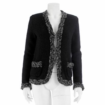 556. CHANEL, a black woolblend cardigan, size 36.