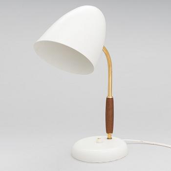 A mid-20th century tablelamp for Stockmann Orno, Finland.