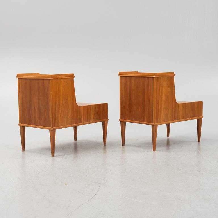 A pair of bedside tables, mid-20th century.