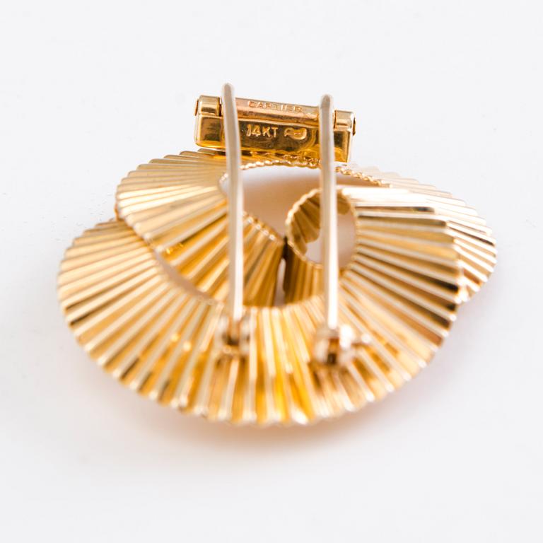 CARTIER, A 14K gold brooch . Marked 289C.