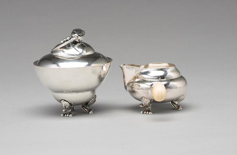 Georg Jensen, a four pieces of "Blossom" tea- and coffee set, Copenhagen 1918-1919, 830/1000 silver, design nr 2 and 100.