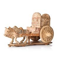 A pottery model of an ox with cart, Tang dynasty (618-907).