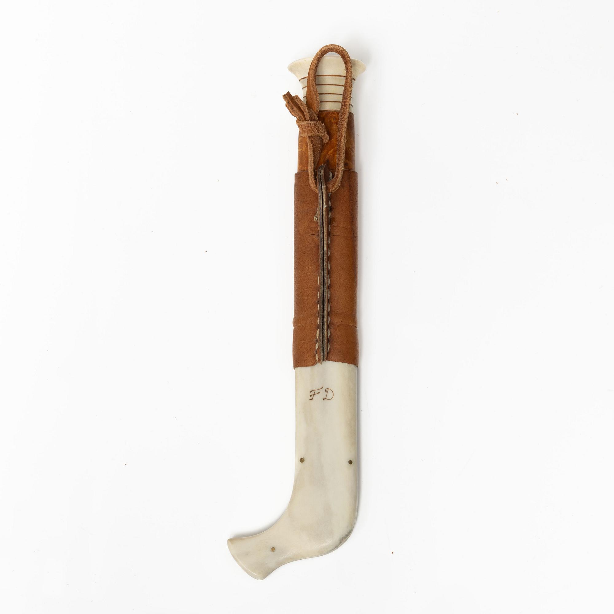 Half-horn knife, signed.