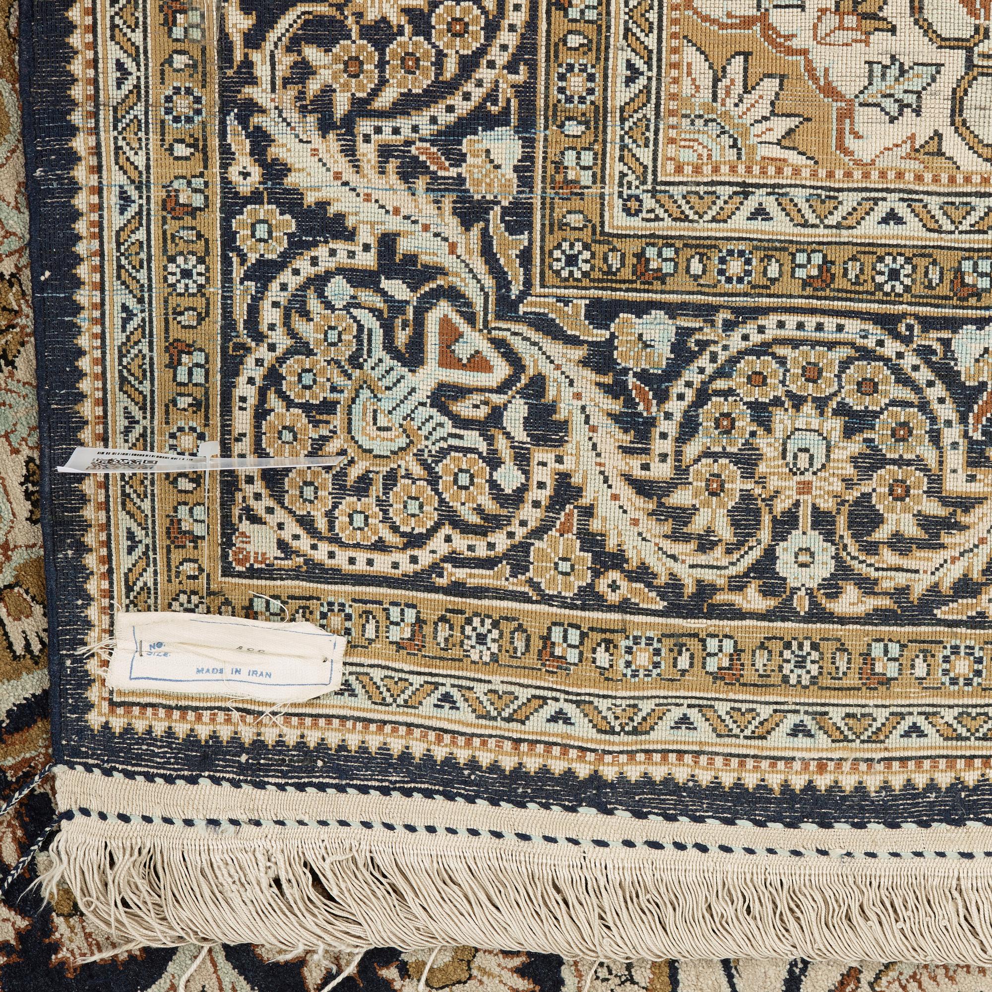 A silk Qum carpet, around  219 x 137 cm.