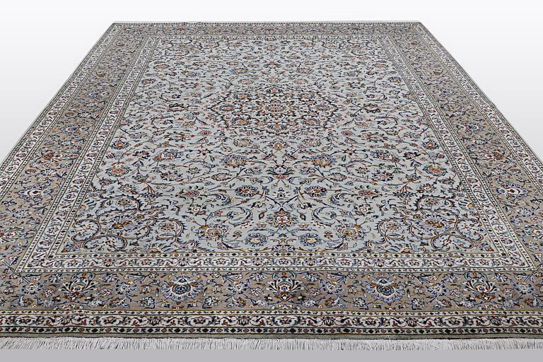 A carpet, Kashan, signed Fani, ca 420 x 300 cm.