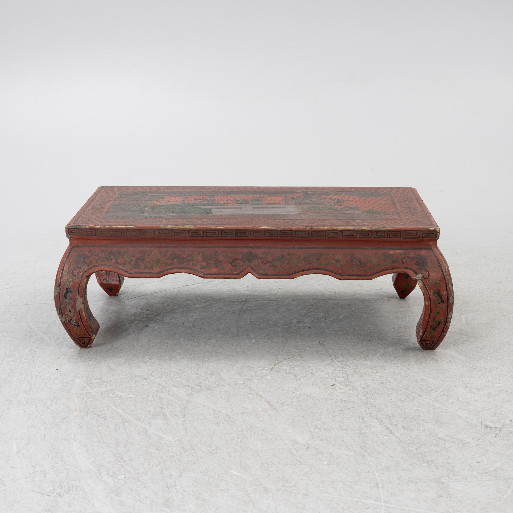 A Chinese red lacquered table, first quater of the 20th century.
