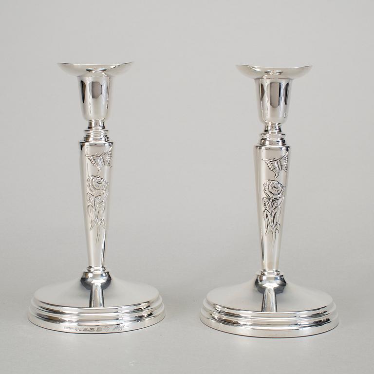 A pair of silver candlesticks by Meya Lerible for Mema, Linköping 1994.