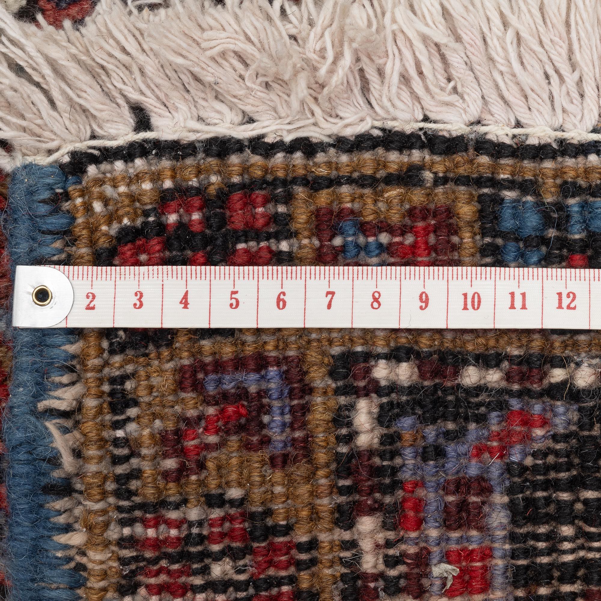 A Heris/Gorovan carpet, c. 325 x 235 cm.