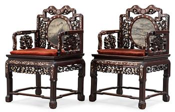 1335. A pair of chinese hardwood and stone armchairs, first half of 20th Century.