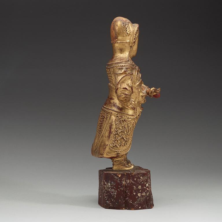 A wood sculpture of a guardian figure, (1644-1912).