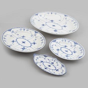 Royal Copenhagen, a 116-piece 'blue Fluted' porcelain dinner and coffee service, half lace, Denmark, mostly 1923-34.