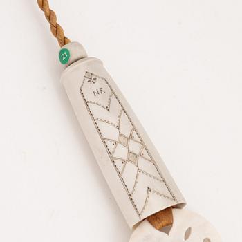 A reindeer horn needle case by Nikolaus Fankki, before 1964, signed.